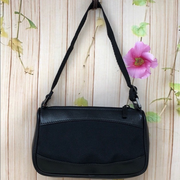 Gucci Handbags - Authentic Gucci Black Canvas Mini Pochette